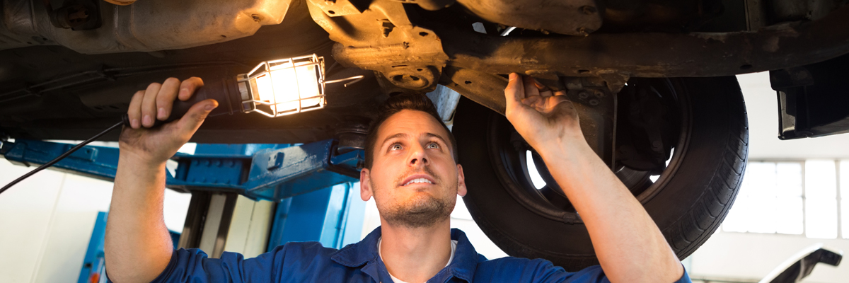 Mechanic doing an MOT inspection - MOT Sudbury